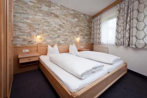 Postel nebo postele na pokoji v ubytování Ferienhaus Auer