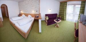 Postel nebo postele na pokoji v ubytování Ferienhaus Auer