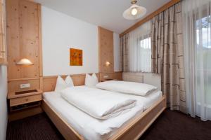 Postel nebo postele na pokoji v ubytování Ferienhaus Auer