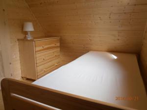 Postel nebo postele na pokoji v ubytování Zrubovy dom Silvia