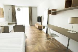 Postel nebo postele na pokoji v ubytování Ca' Barbini Resort