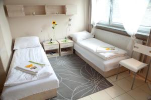 Posteľ alebo postele v izbe v ubytovaní Standard Delegacyjny Bed & Breakfast + 37 fotografií