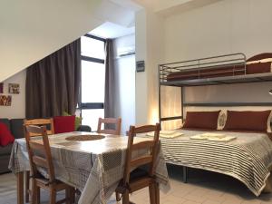 Posteľ alebo postele v izbe v ubytovaní Zafferana Lavica Apartment