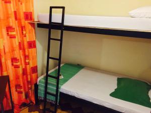Voodi või voodid majutusasutuse Hostel Dodero toas