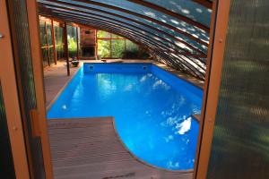 an infinity pool in a house at Krolowo Apartment in Krościenko