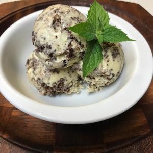 two ice cream balls with a green leaf on a plate at The Kennebunk Inn in Kennebunk