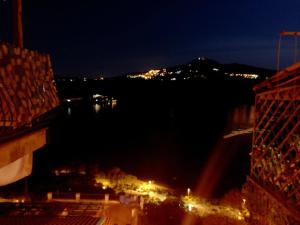 a view of a city at night with lights at Apartment Castel Gandolfo in Castel Gandolfo