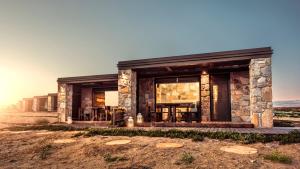a small stone house in the desert at Keros Blue - Luxury in Wilderness in Kalliópi