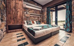 Posteľ alebo postele v izbe v ubytovaní Keros Blue - Luxury in Wilderness + 37 fotografií