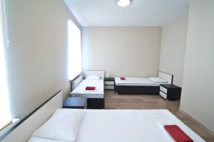 Postel nebo postele na pokoji v ubytování Bella Riga Hotel with Self-Check in