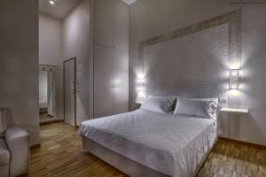 Postel nebo postele na pokoji v ubytování Muragie del Castello B&B
