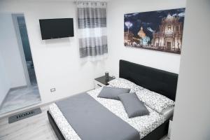 Tourist's home tesisinde bir odada yatak veya yataklar