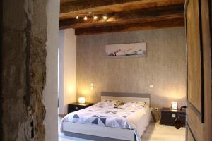 Katil atau katil-katil dalam bilik di Domaine d'Alcapiès