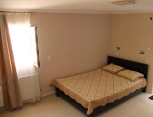 Voodi või voodid majutusasutuse Guesthouse Levani toas