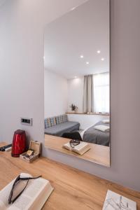Postel nebo postele na pokoji v ubytování Central City Hotel