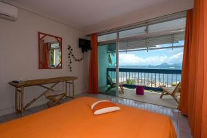 Llit o llits en una habitació de Hotel-Restaurant La Dunette