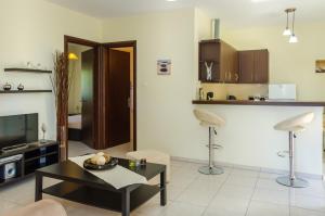 Kuchyň nebo kuchyňský kout v ubytování Olivera Apartments