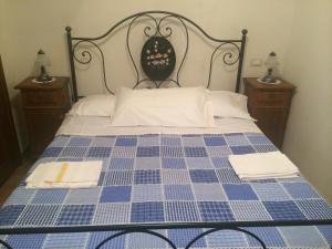 En eller flere senge i et værelse på Casa a Santo Stefano di Sessanio