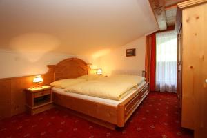 Posteľ alebo postele v izbe v ubytovaní Appartements Wirnsperger + 37 fotografií