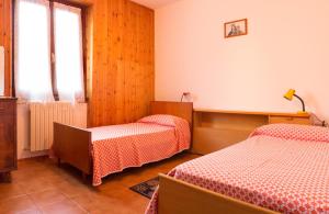 Cama o camas de una habitación en Maurice des Alpes