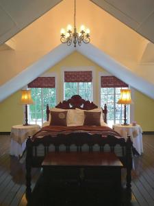 Ένα ή περισσότερα κρεβάτια σε δωμάτιο στο Diggersrest Lodge