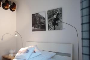 Een bed of bedden in een kamer bij Müller Inn B&B