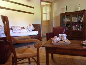 Coin salon dans l'établissement Gîte et chambres d'hôtes "La Tourtette" 12 pers