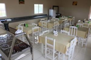 En restaurant eller et andet spisested på Pousada Sol Nascente