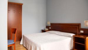 Posteľ alebo postele v izbe v ubytovaní Hotel Due Palme