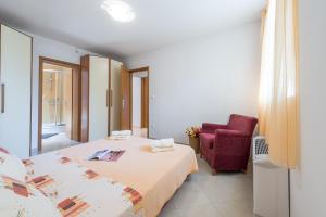 Кровать или кровати в номере Gorgeous apartment Dora