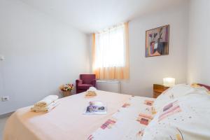 Кровать или кровати в номере Gorgeous apartment Dora