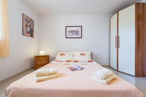 Кровать или кровати в номере Gorgeous apartment Dora