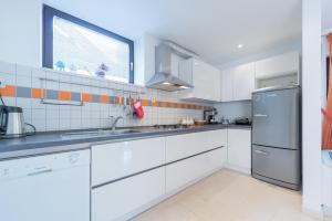 Кухня или мини-кухня в Gorgeous apartment Dora
