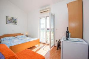 Posteľ alebo postele v izbe v ubytovaní The best location in Makarska,free P, option bikes