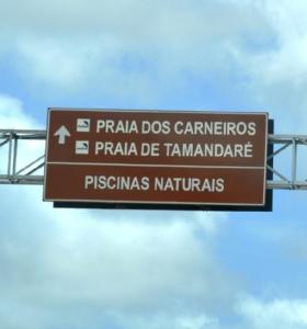a brown sign that reads pisa dos cantosarmaarmaarmaarmaarma istg at FLATS VISTA MAR e FRENTE MAR NA PRAIA DOS CARNEIROS in Praia dos Carneiros