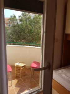 Postel nebo postele na pokoji v ubytování Beachfront Family Escape, Ciovo