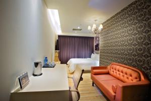 Area soggiorno di FX Hotel Tainan