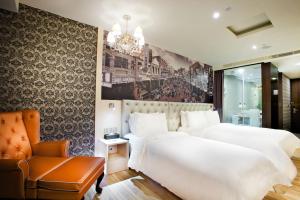Letto o letti in una camera di FX Hotel Tainan