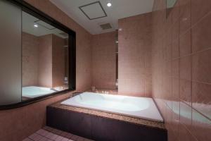 Ett badrum på HOTEL SULATA GIFU HASHIMA (Adult Only)