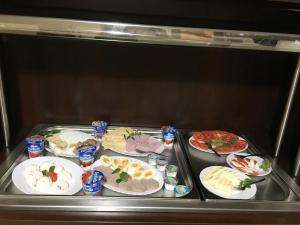 Comida no cama e café (B&B) ou em algum lugar perto
