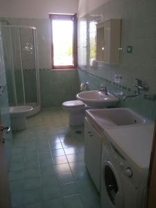 Phòng tắm tại Appartamenti La Chiandata