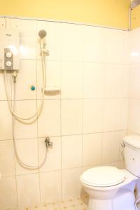 Koupelna v ubytování Visal Sak Guesthouse + 37 fotografií