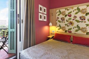 Posteľ alebo postele v izbe v ubytovaní Hotel Ginebra