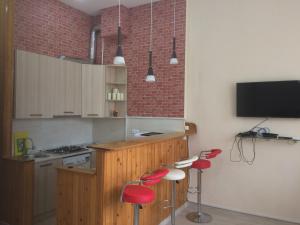 Una cocina o zona de cocina en Modern Apartment Avlabari