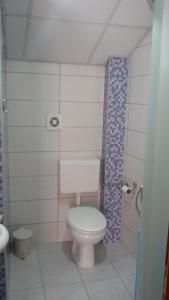 Koupelna v ubytování Athos Apartments + 37 fotografií