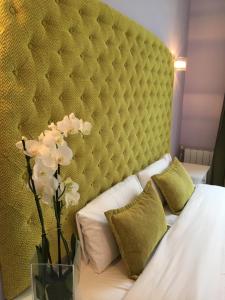 Posteľ alebo postele v izbe v ubytovaní Hotel Ginebra