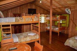 Palanda nebo palandy na pokoji v ubytování Hosteria Kindi Wasi