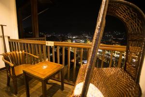 Balkoni atau teres di Wang Jiang Reclusive Boutique Inn