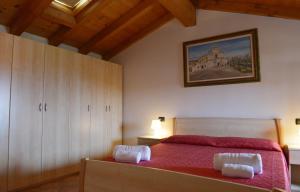 Postel nebo postele na pokoji v ubytování B&B Antiche Mura