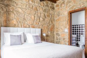 Cama ou camas em um quarto em Casa Da Padeira - Turismo Rural